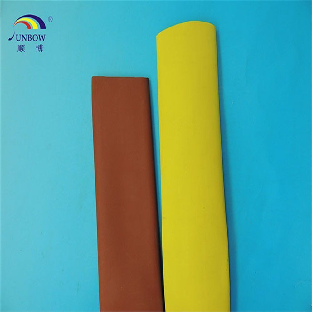 Orange EV heat shrink tubing on high-voltage cable harness